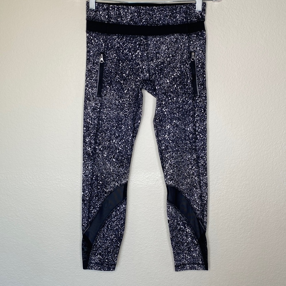 Lululemon leggings black mesh spots Sz 4 pockets